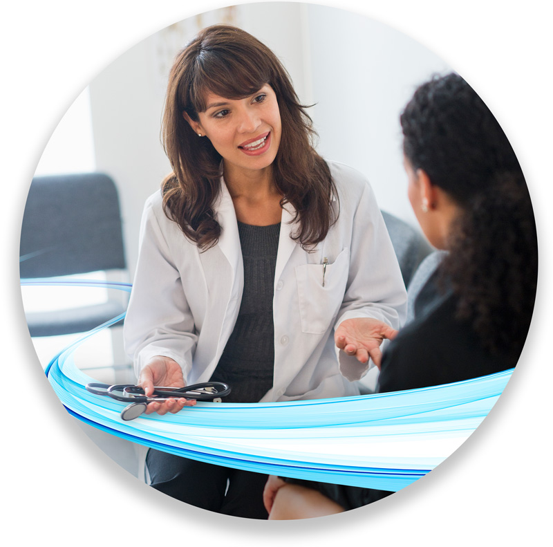 woman talking to doctor